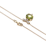 18ct yellow gold peridot and diamond pendant.