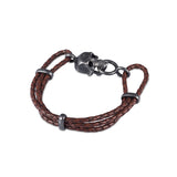 Brown Leather Adjustable Bracelet With Skull Clasp In Matte Black Finish